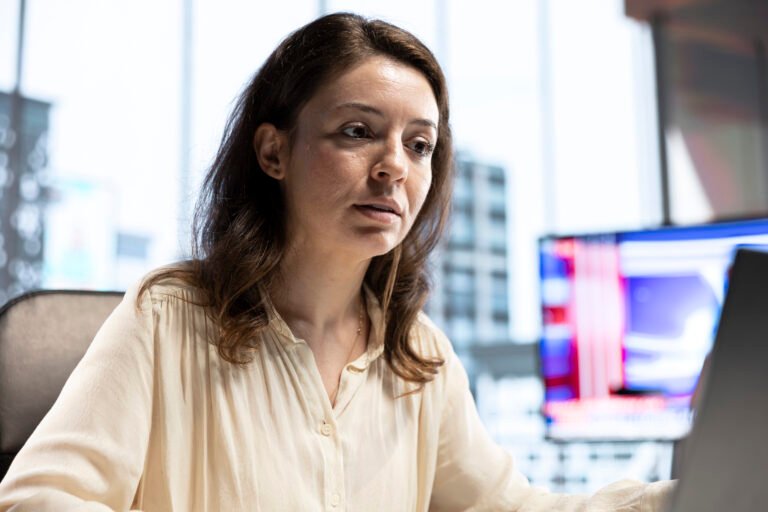 Skilled empowered female CEO negotiating with shareholders on online conference, asking for more funds to sustain an expansion project. Businesswoman director driven for success, leadership skills.